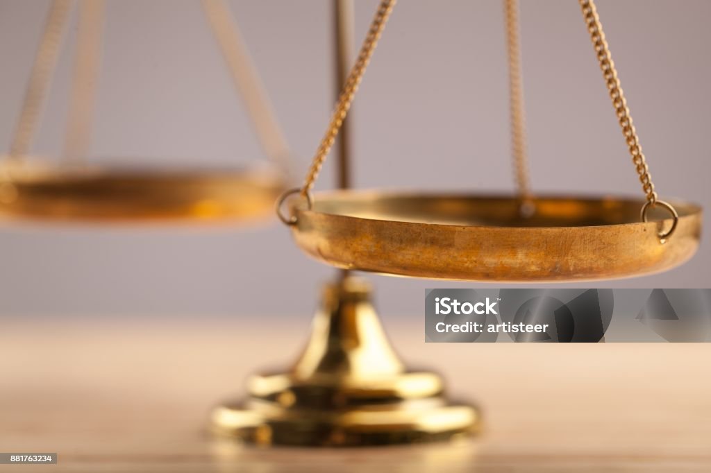 Justice. Law scales on table, close-up view Weight Scale Stock Photo