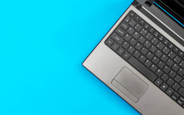 istock Laptop on a blue. Top view. Business, technological and education concept. 881763256