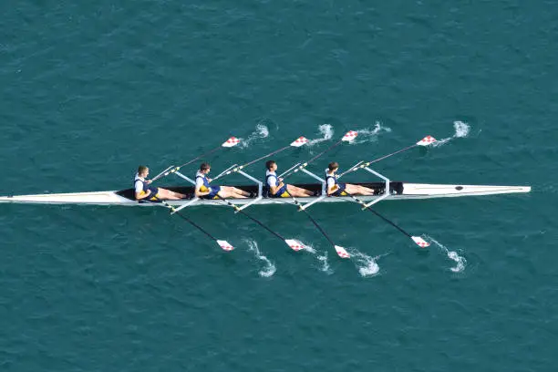 Photo of Male Quadruple Scull Rowing Team At the Race, Lake Bled, Slovenia