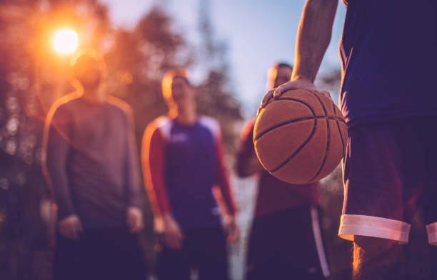Always ready for a challenge Basketball player holding ball at outdoor court team sport stock pictures, royalty-free photos & images