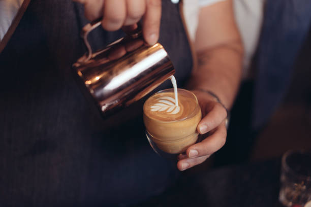 istock Barista Pouring Latte Art 881780208