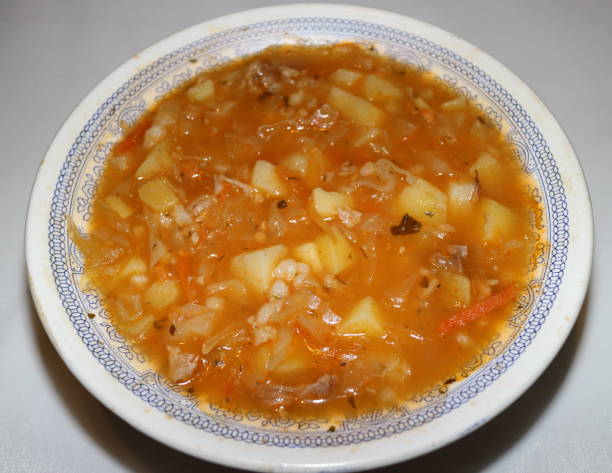 istock fresh cabbage soup and meat in a plate 881794682