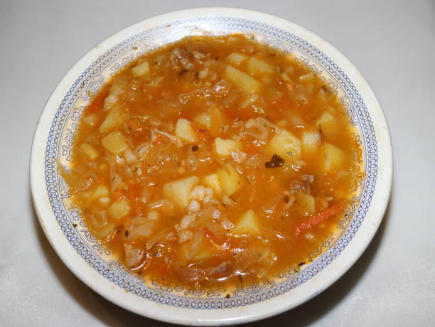 istock fresh cabbage soup and meat in a plate 881794698