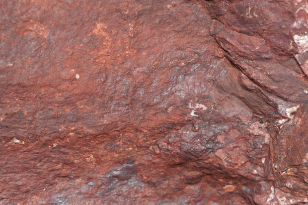 istock Surface of a sandstone covered by iron oxides 881795220