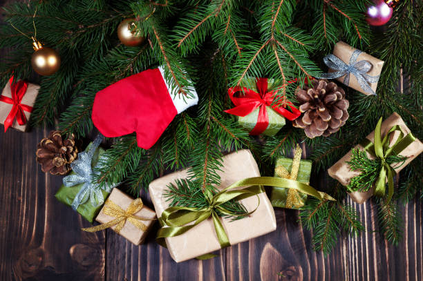 istock Boxes with gifts near Christmas tree 881820958