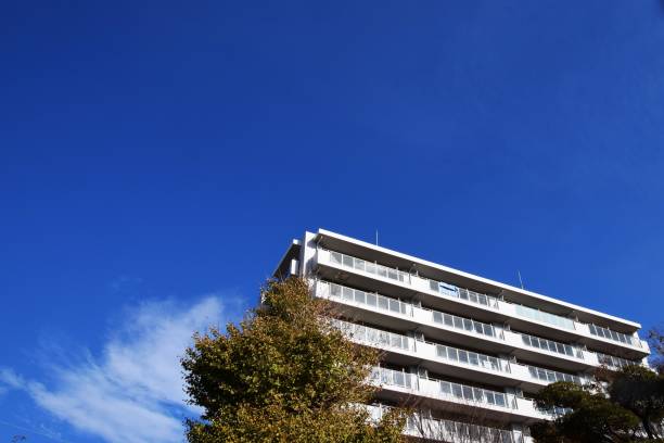 istock Autumn sky and building 881823798