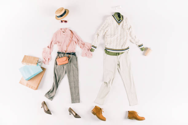 istock stylish clothes with shopping bags 881842800