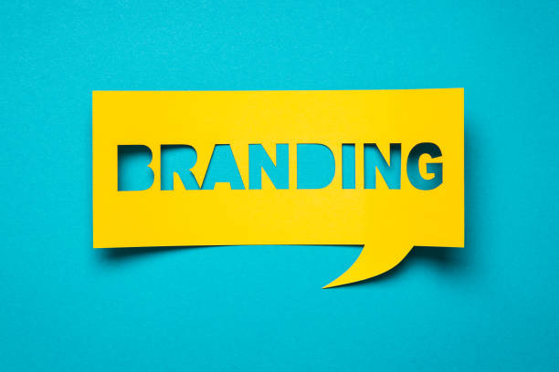 Banner with the phrase cut. Bubble speech with cut out phrase "branding" in the paper. brand strategy stock pictures, royalty-free photos & images