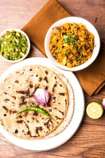 istock Zunka Bhakar Pithla or pitla, popular vegetarian recipe from India 881856434