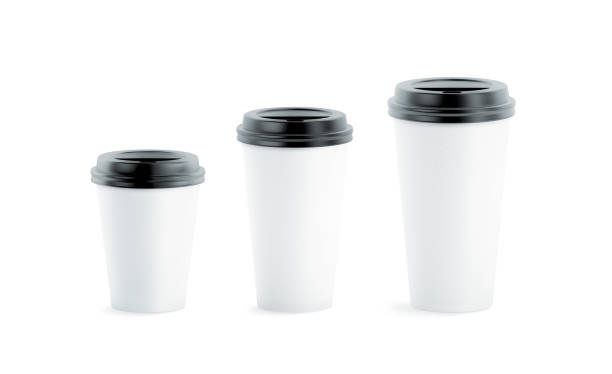 istock Blank white disposable paper cup mock ups with black lids 881861326