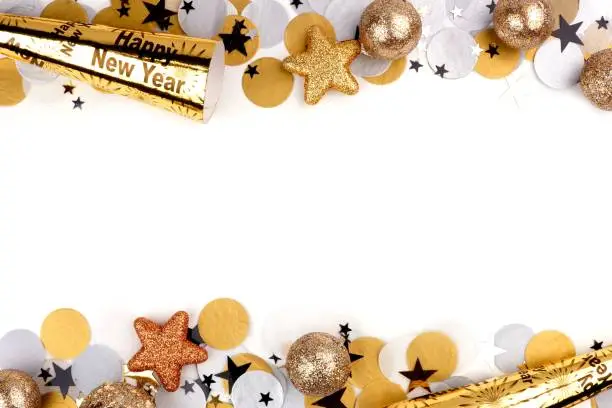 New Years Eve double border of confetti and party decor isolated on a white background
