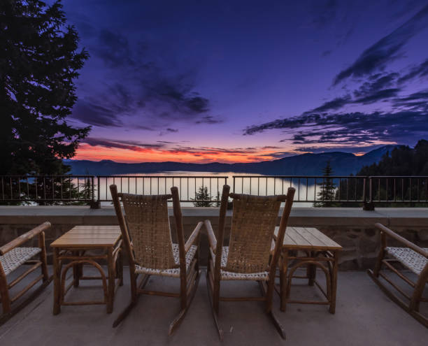 istock Rocking Chairs Overlook Sunrise at Crater Lake 881871382