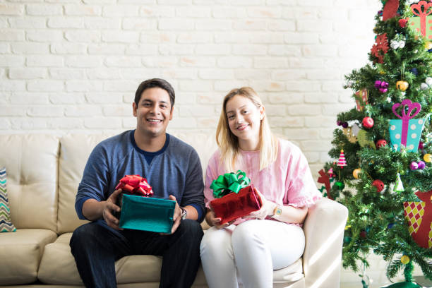 istock Happy couple with Christmas gifts 881875862