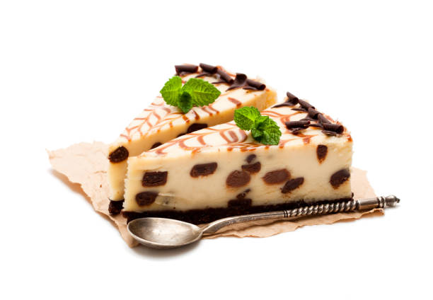 Baked  white and dark chocolate cheese cake isolated on white
