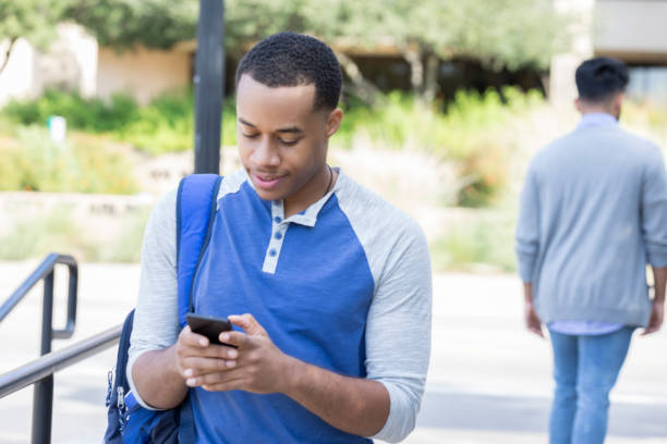 istock Handsome African American college student on campus 881879218