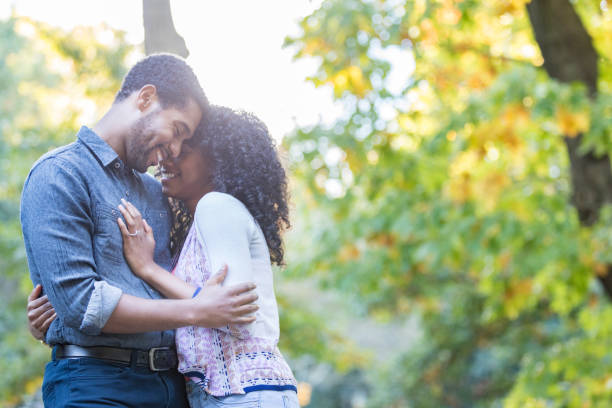 istock Attractive young couple on a date in Central Park 881881684
