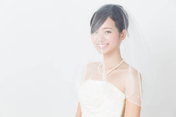 istock attractive asian woman wedding image on white background 881881774