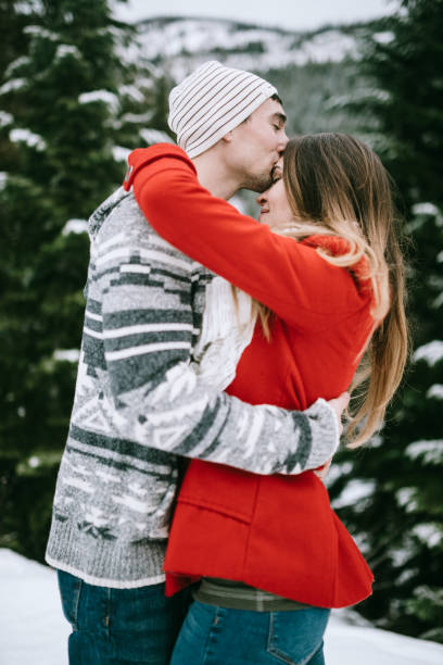 istock Loving Couple on Fun Snow Adventure 881886626