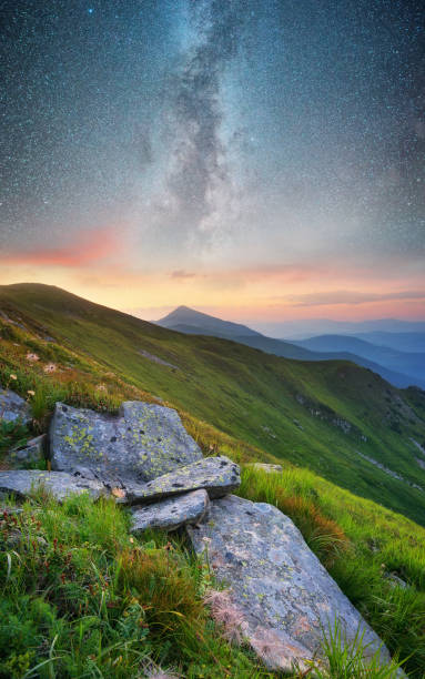 istock Mountain valley and night sky. Natural summer landscape 881886718
