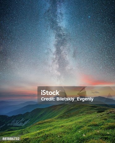istock Mountain range and night sky. Natural summer landscape 881886732