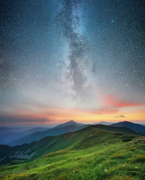 Photo of Mountain range and night sky. Natural summer landscape