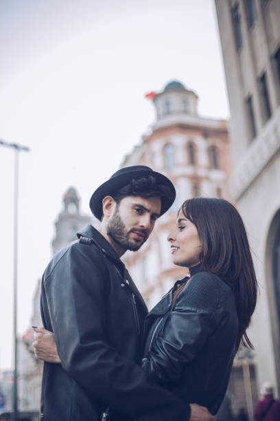 istock Modern couple in city 881887120
