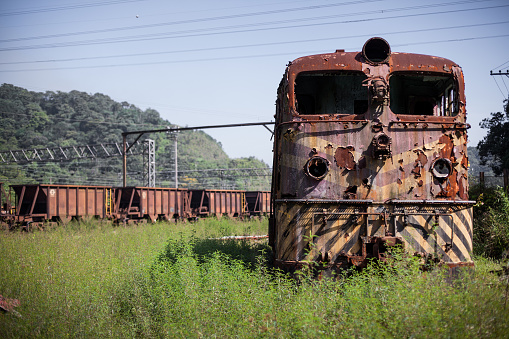 Railroad Car Oil Tanks Industrial Gas and Oil Equipment in the Western USA Industrial Crude Oil and Fuel Tanker Cars on Track Near Storage Transfer Facility on Train Tracks Photo Series - Matching Video in Portfolio