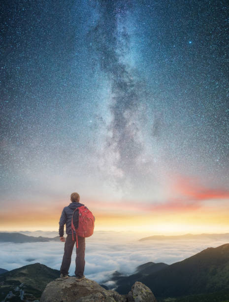 istock Silhouette of a champion on mountain peak. Active life concept 881900662