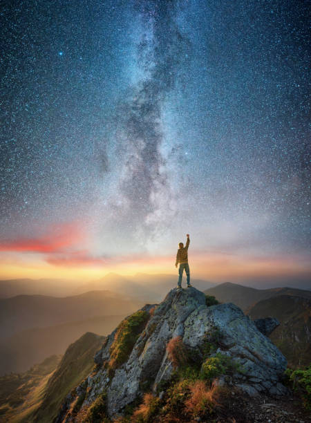 istock Silhouette of a champion on mountain peak. Active life concept 881900666