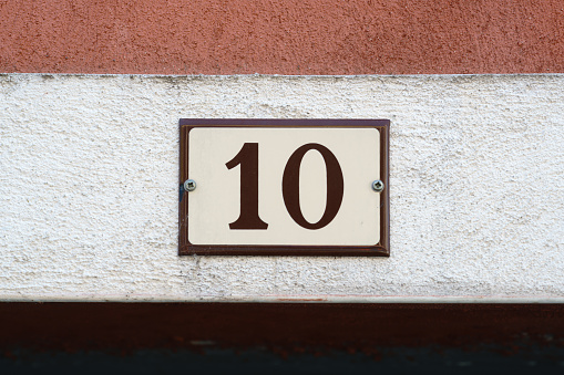 Enameled house number ten (10)