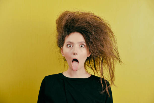 istock girl with a strange hair style 881939054