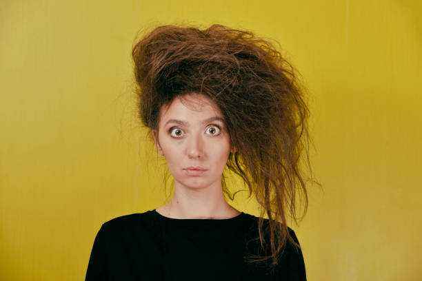 istock girl with a strange hair style 881939086