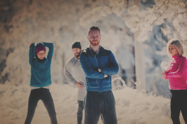 istock Sportspeople on snowy mountain 881941594