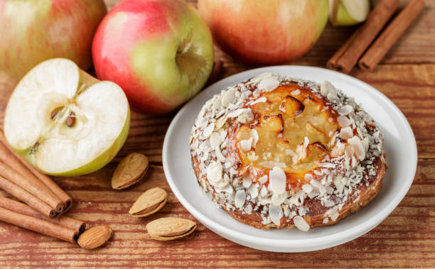 istock Homemade Apple pie with almonds and cinnamon. Dessert for tea in a rustic style. Selective focus 881941834