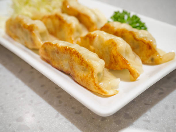 istock Gyoza dumplings with vegetables 881952962