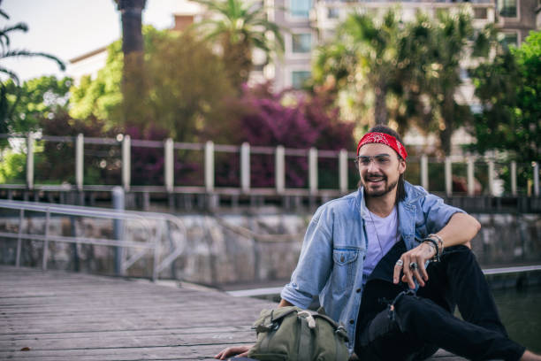 istock Guy relaxing alone outdoors 881955798