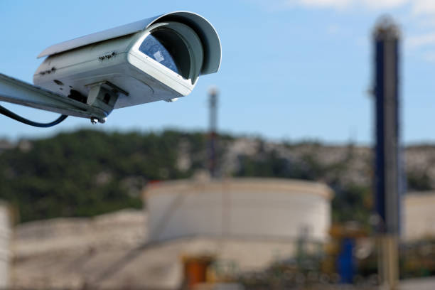 istock closeup on security CCTV camera or surveillance system for industrial site protection 881958860