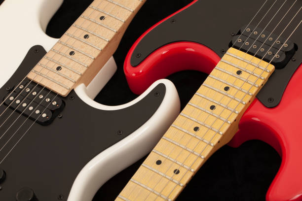 istock Red and White Electric Guitars 881962642