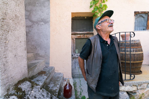 Italian man at his wine cellar