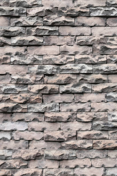 istock Texture of old weathered brick wall decayed and broken malfunctioning degraded for design background. 881999460