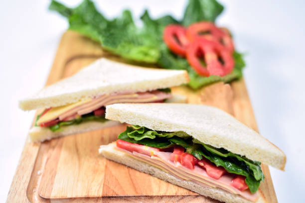 istock Closeup of a classic ham and cheese sandwich. 882002336