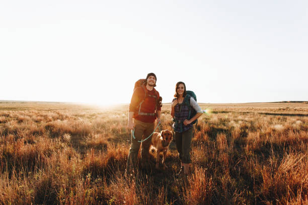 istock Couple hiking together in the wilderness 882002374