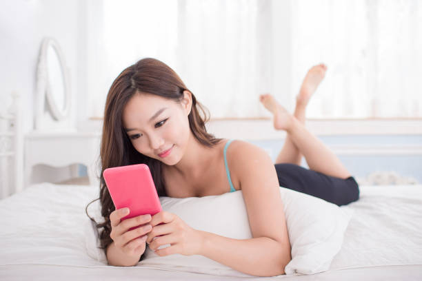 istock woman use phone 882021954