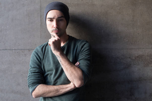 istock Portrait of a young man while thinking 882046174