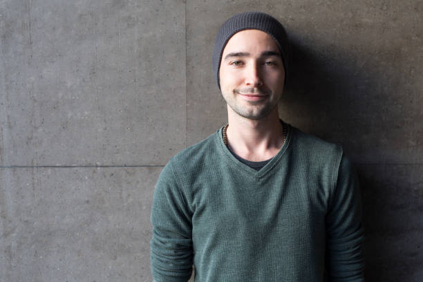 istock Portrait of a happy young man 882054412