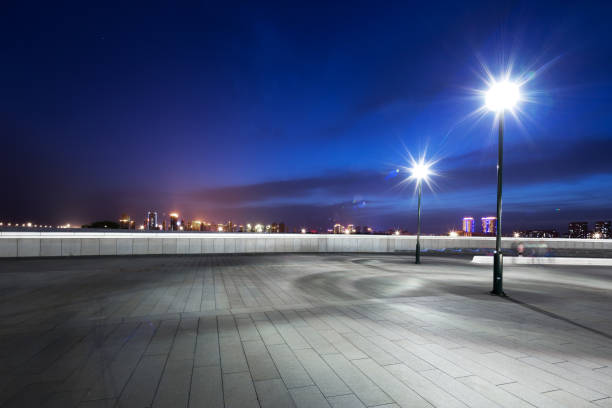 istock empty marble floor with modern cityscape at night 882060486