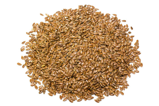 istock Flax seeds isolated on white background 882070910