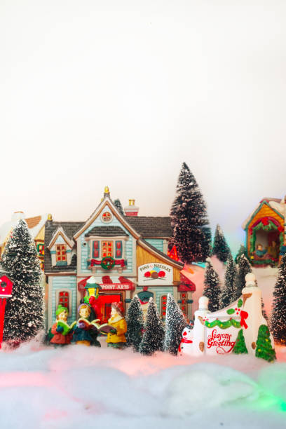 istock Season greeting with Christmas miniature scenery 882081162