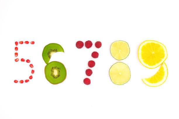 istock numbers from five to nine made of fruit and berries on white background 882088686