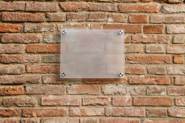 istock Empty information sign on old brick wall. Semitransparent milk color 882091474